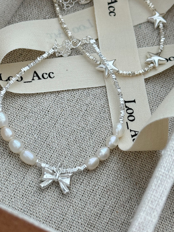 Pearl bracelet with bow